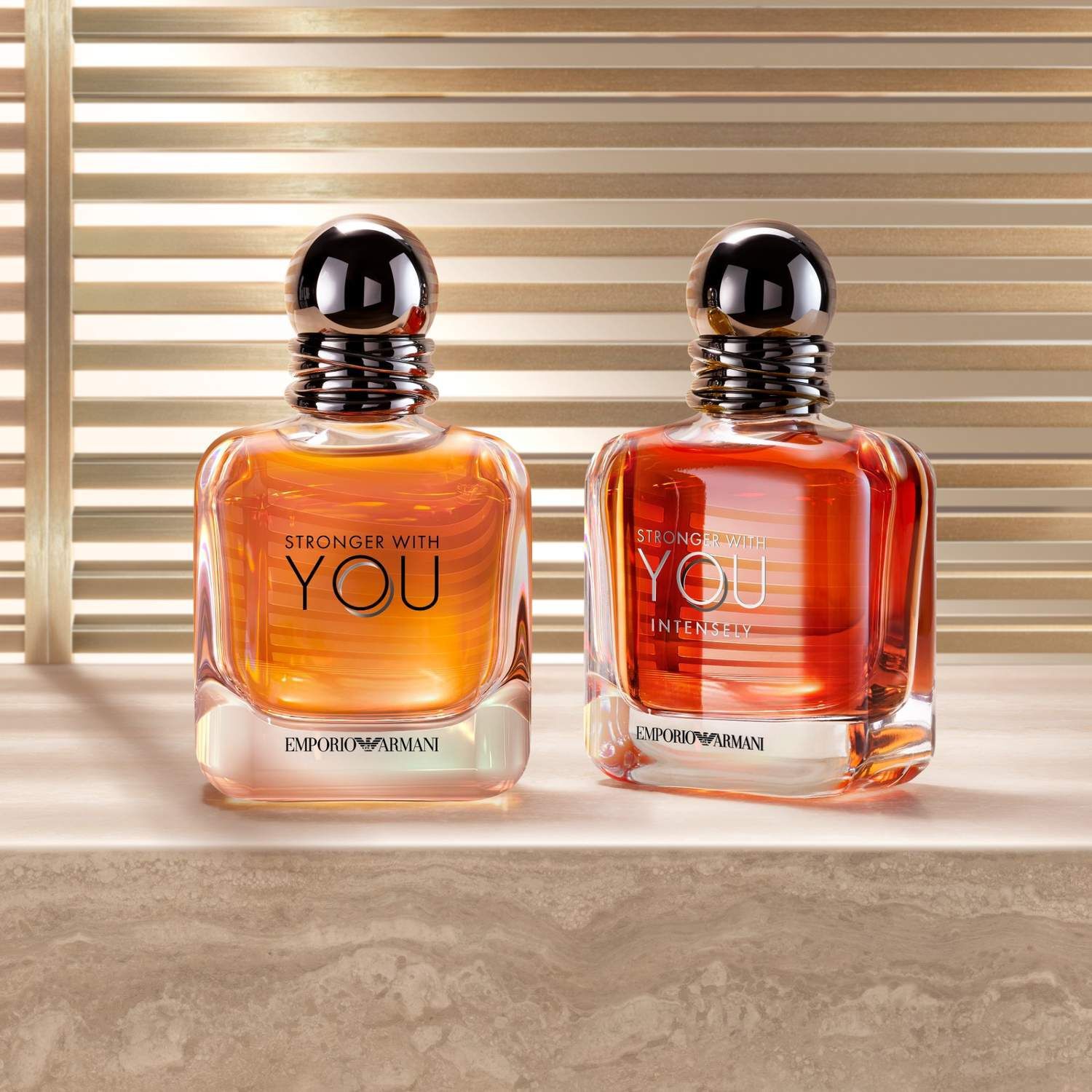 Twee Giorgio Armani parfumflesjes: Si en Acqua di Gio.