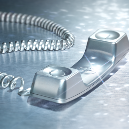 Zilveren telefoonhoorn op metalen oppervlak