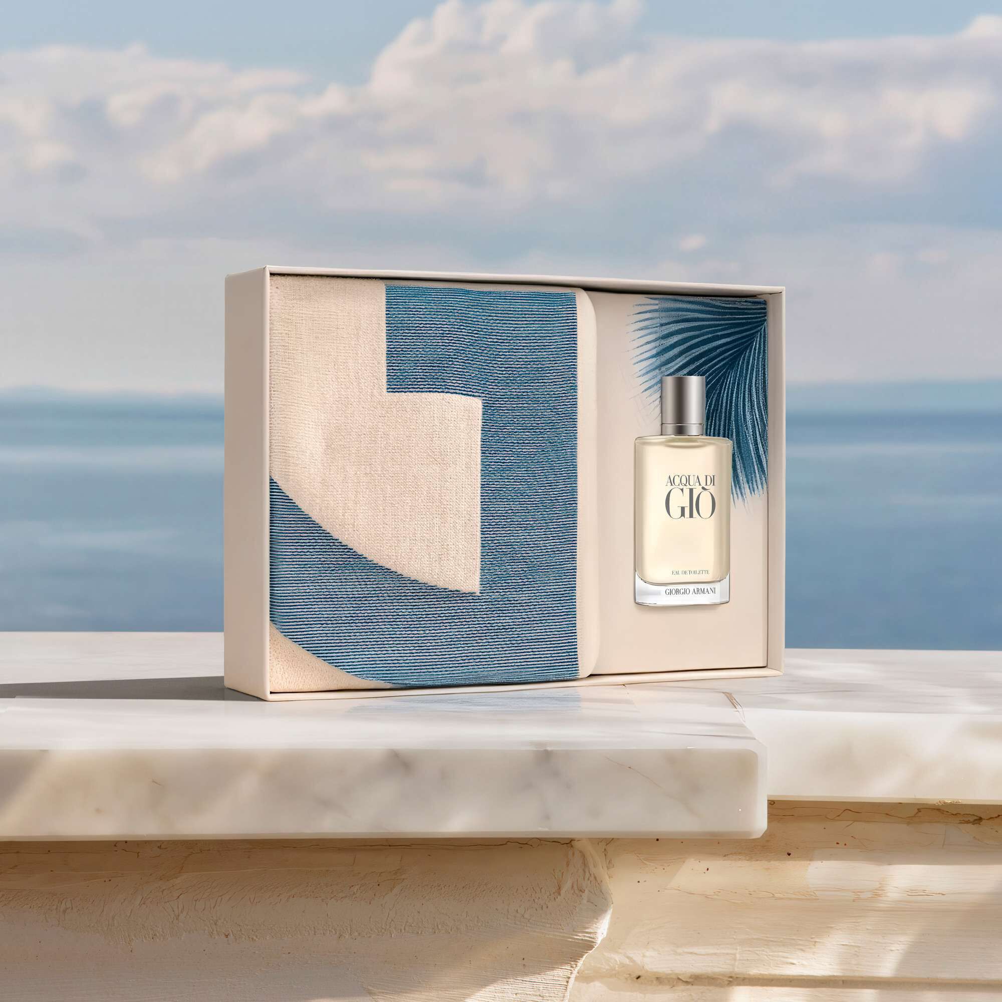 Open Giorgio Armani Acqua di Gio gift set with the iconic men's fragrance and a matching patterned accessory. A perfect sunkissed summer gift inspired by the refreshing spirit of the Mediterranean. 