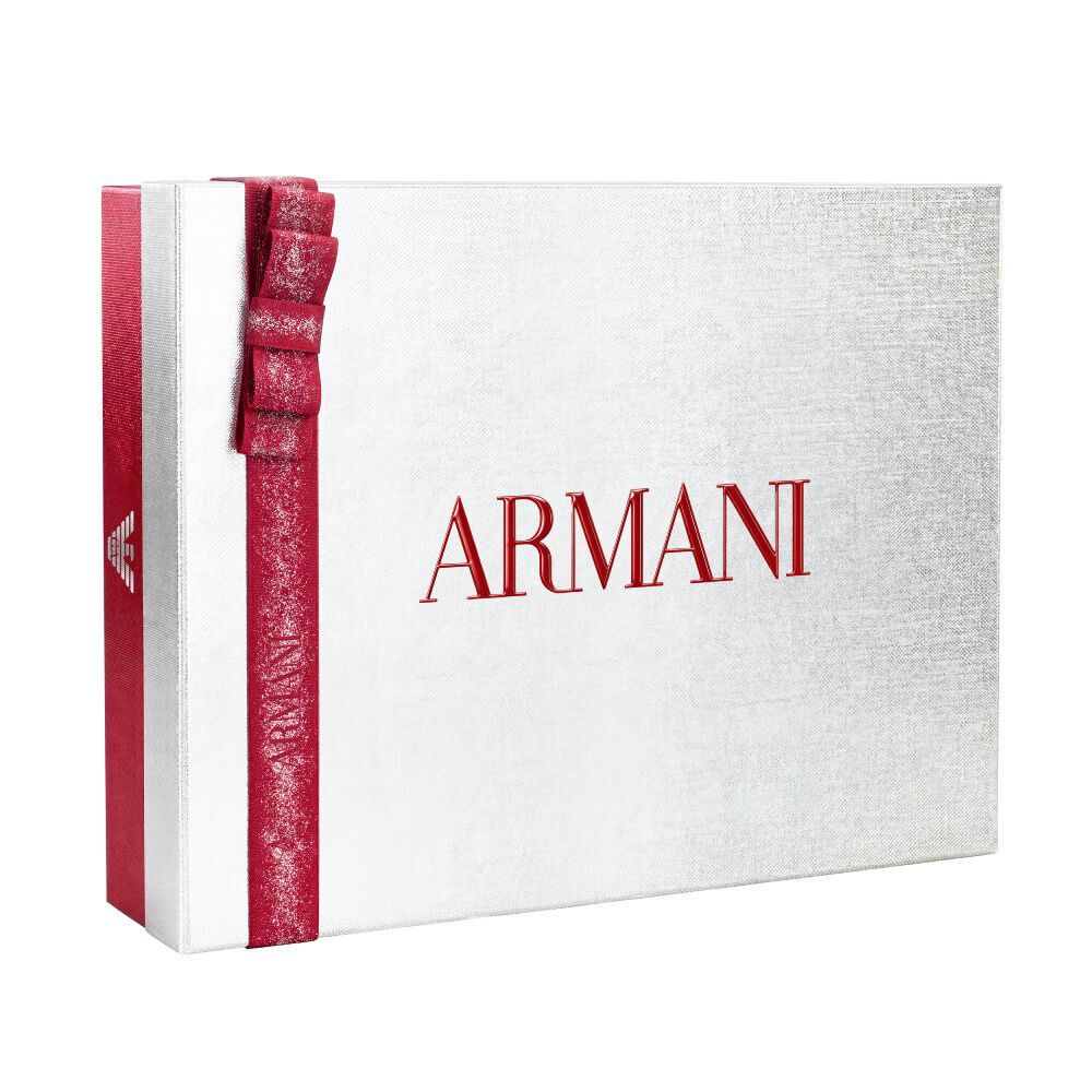 Zilveren Armani feestgeschenkdoos met glinsterende robijnrode strik — Glamoureuze Winter Holiday Cadeauset Doos, witte achtergrond.