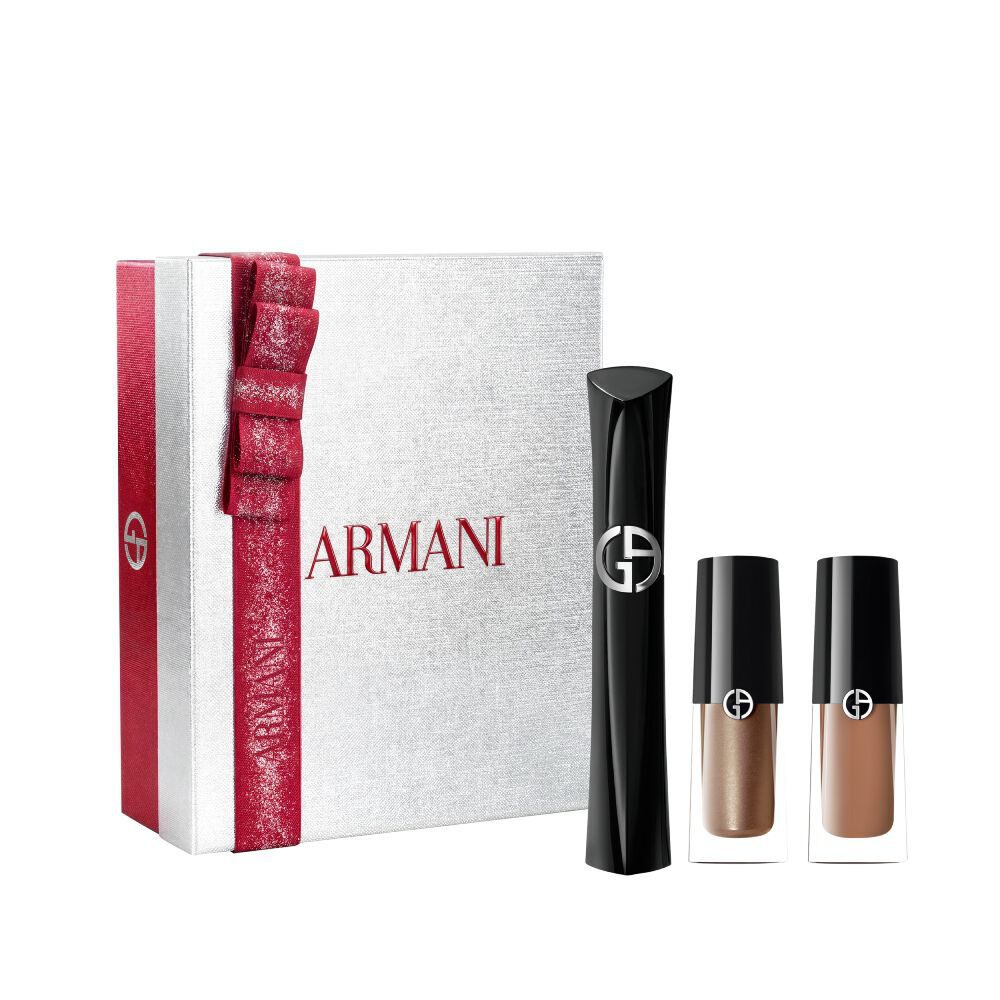 Armani beauty Holiday 2026 open white gift box with red ribbon containing Vertigo mascara and Eye Tint shades 68S Bronzy Brown and 22M Cashew, white background.