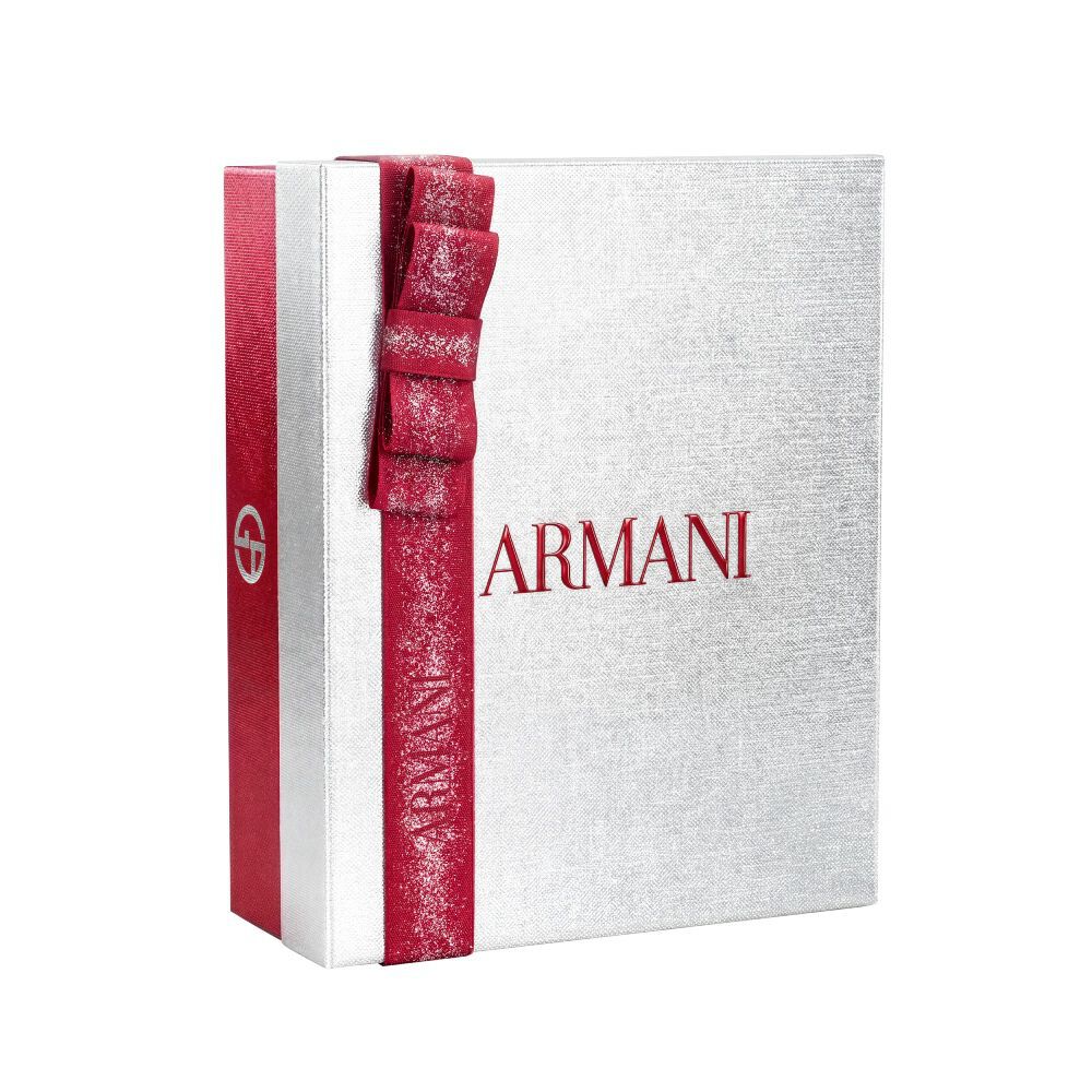 Zilveren Armani feestgeschenkdoos met glinsterende rode lintstrik — Glamoureuze Winter Holiday Cadeauset Doos, witte achtergrond.
