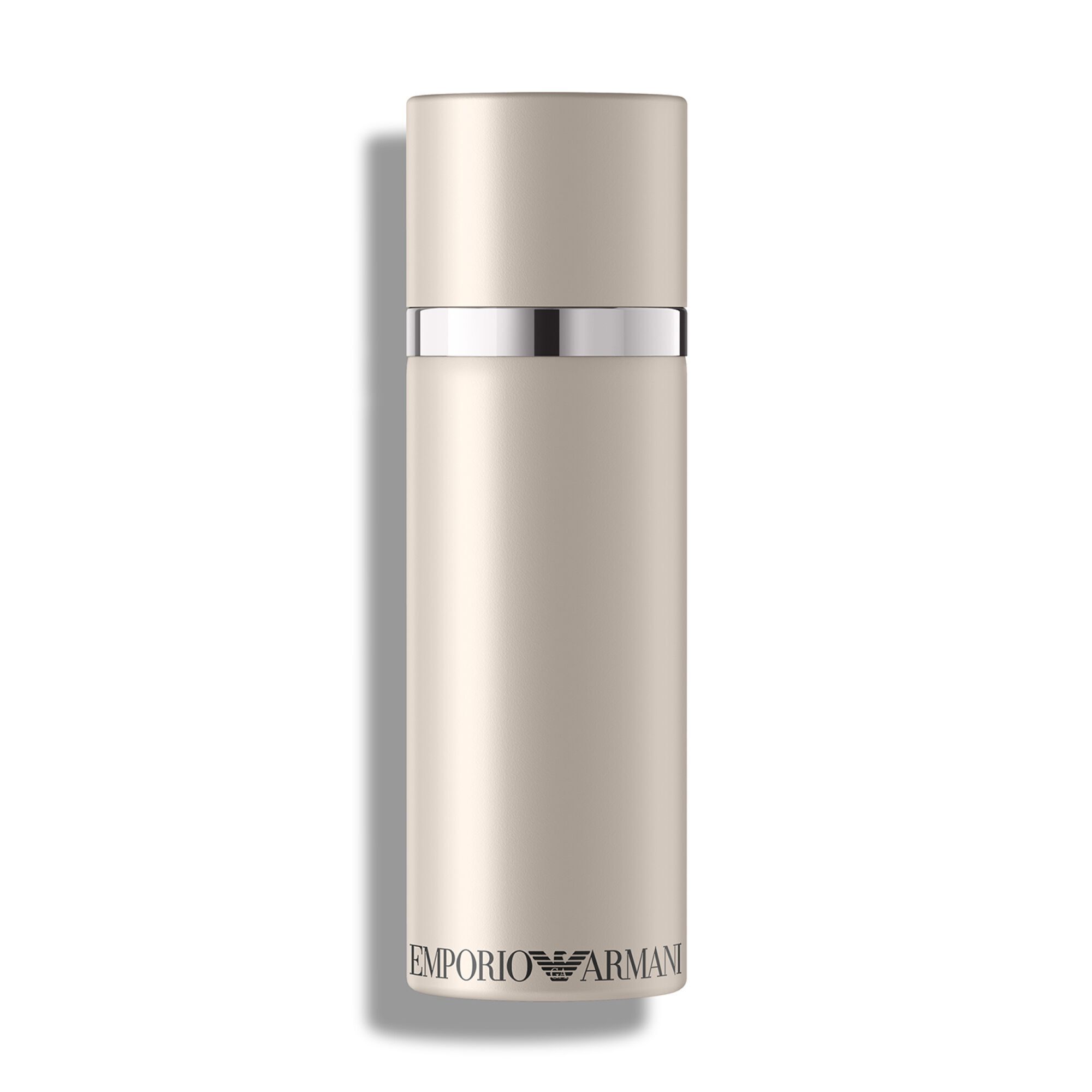 Een slanke, matte lichtbeige cilindervormige 50ml fles Emporio Armani "She" parfum staat rechtop op een wit oppervlak.