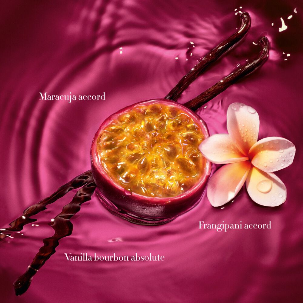 Ruby Power of You Eau de Parfum bottle cap surrounded by a white frangipani flower and water ripples on a deep ruby background — women's floral fragrance by Giorgio Armani.