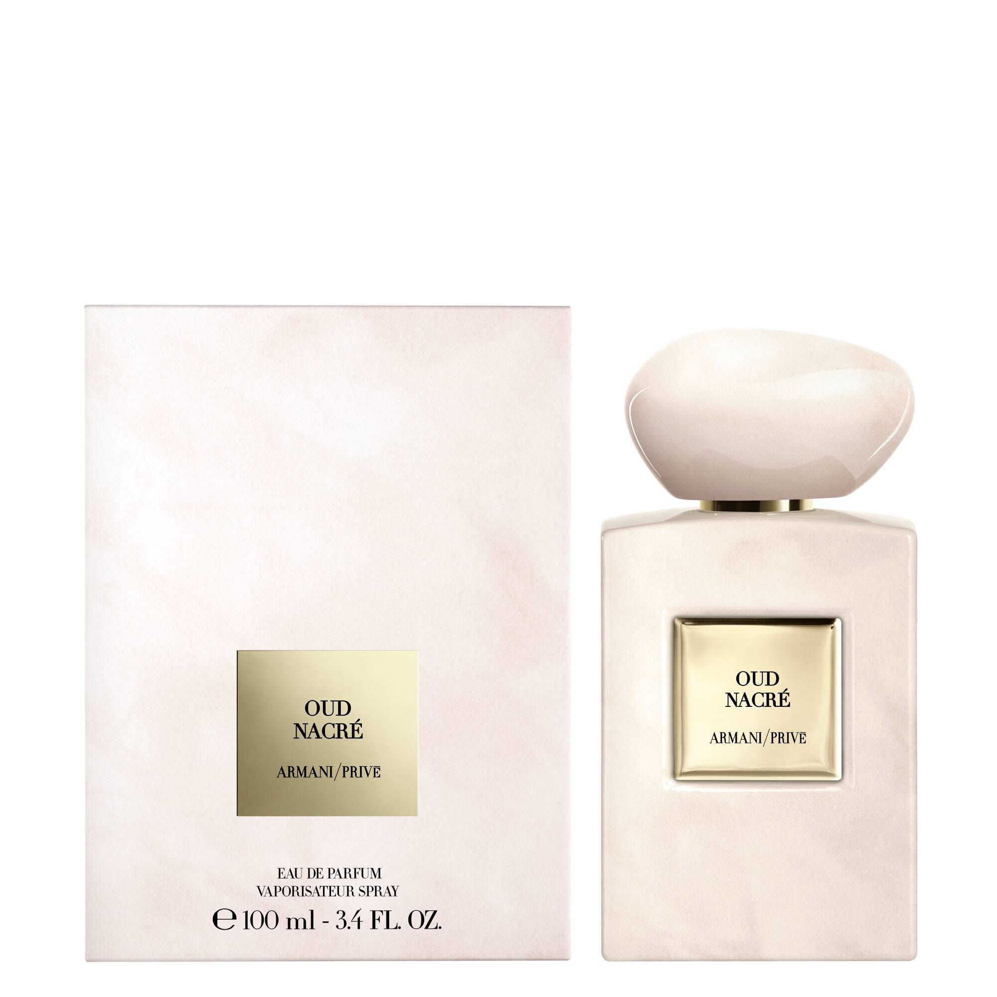 Armani Prive Oud Nacre parfumfles en de witte presentatiedoos.