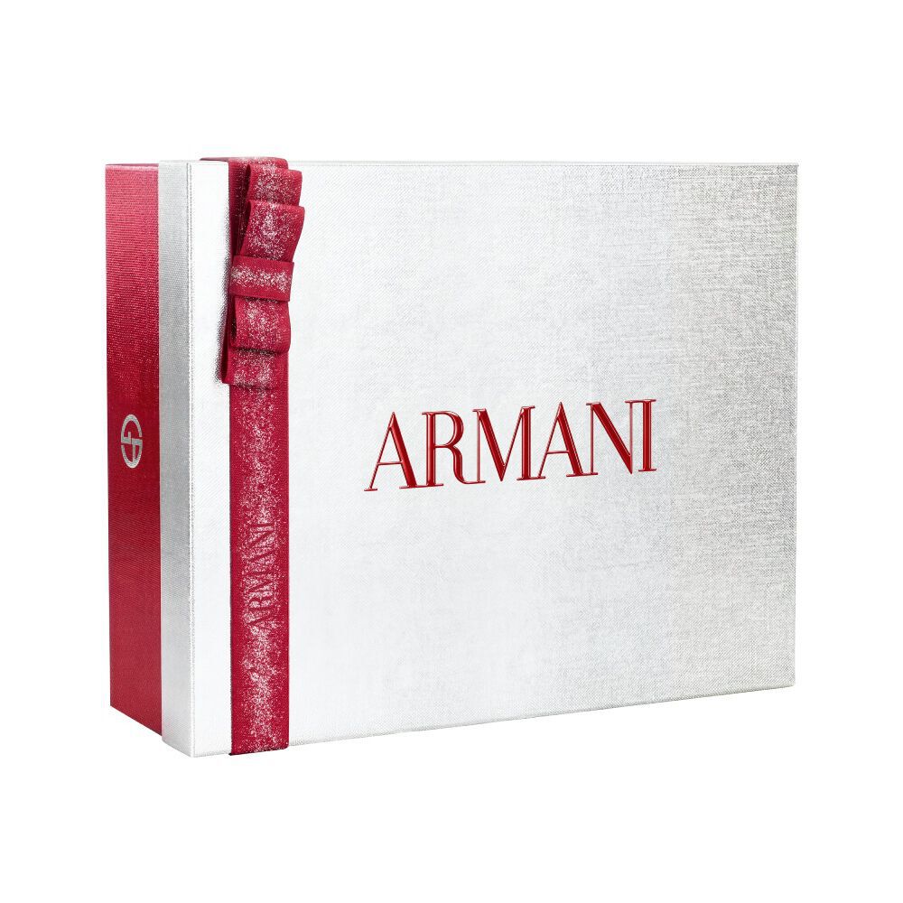 Zilveren Armani feestgeschenkdoos met glinsterende rode lintstrik — Glamoureuze Winter Holiday Cadeauset Doos, witte achtergrond.