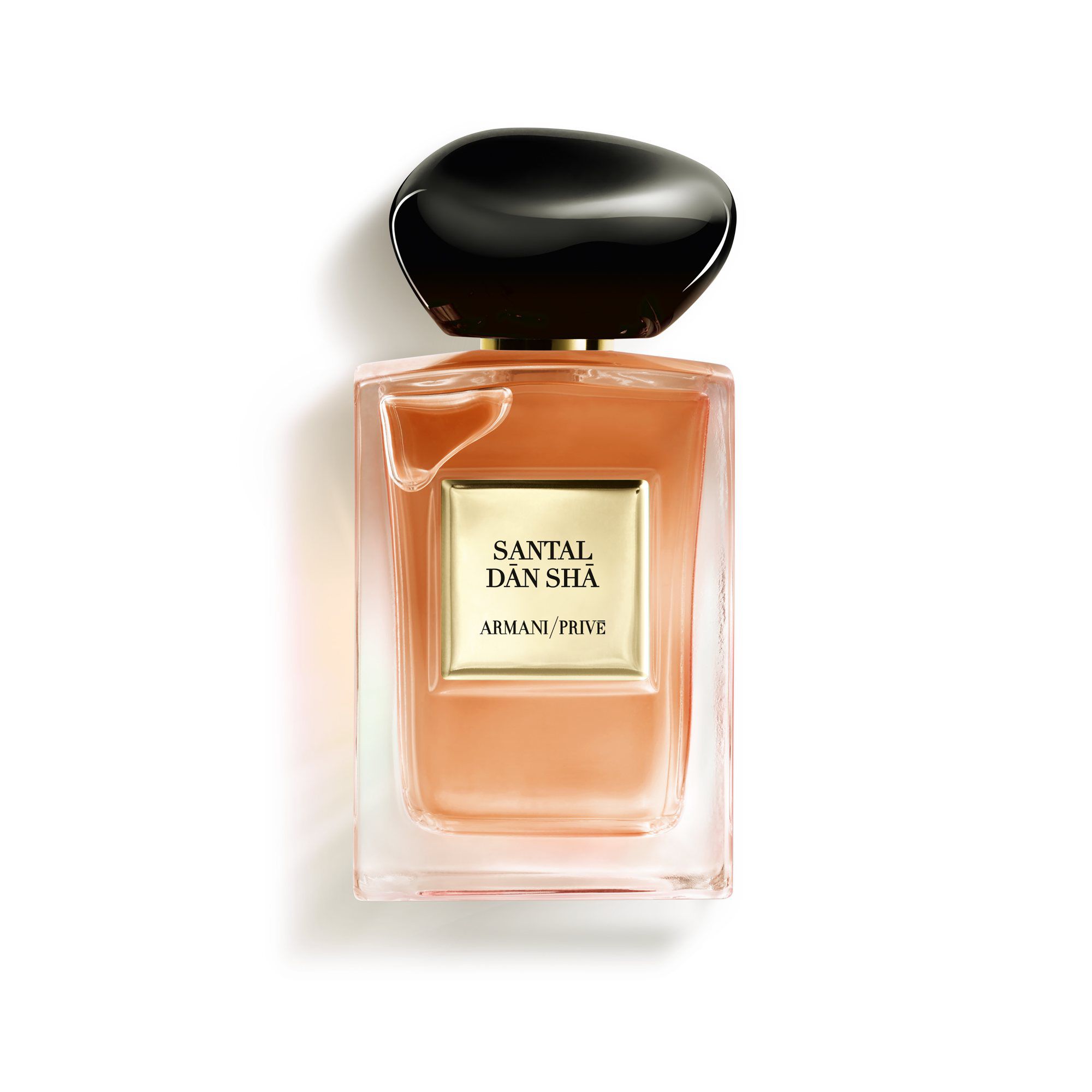 Flesje parfum 'Santal Dân Shâ' van Armani Prive met een elegante ontwerp en zwarte dop.